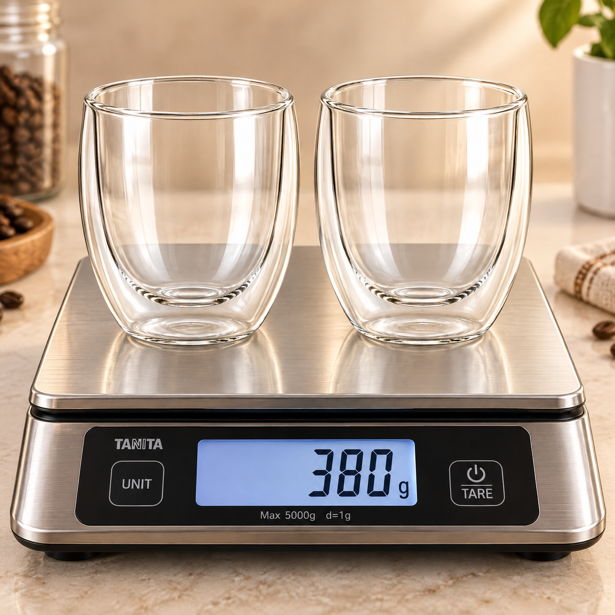 Matching pair of empty double-wall glass coffee cups